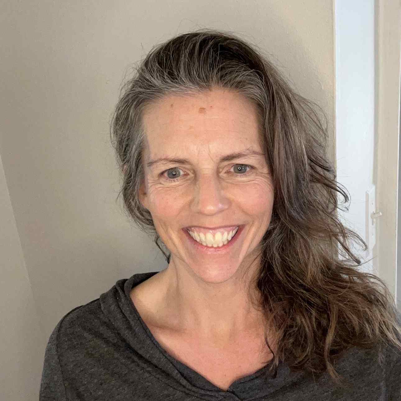 Deana Cotter recovery coach headshot smiling, representing Project Courage support