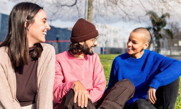 Teens in outpatient addiction recovery program sharing peer support