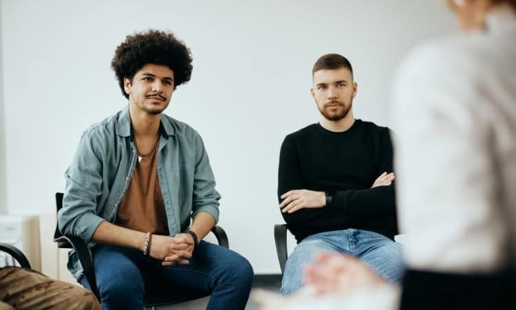Teens in outpatient addiction treatment group therapy session