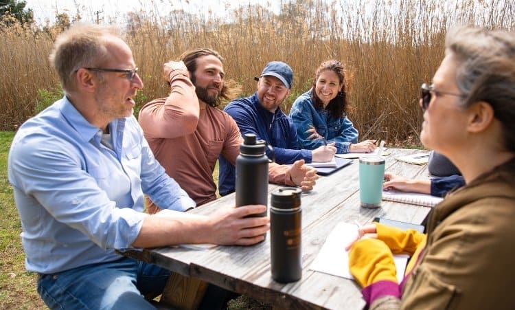 Families connecting during a supportive group session for drug addiction recovery and long-term healing