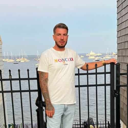 Matt Gaffey of Project Courage standing by the waterfront, reflecting confidence and recovery support