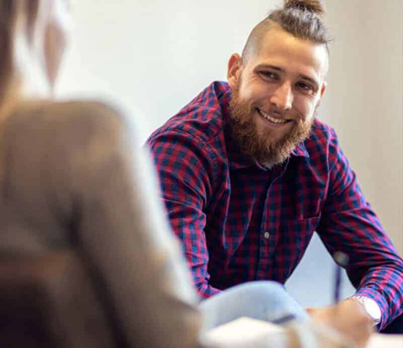 Man receiving compassionate support during a substance abuse recovery counseling session in CT