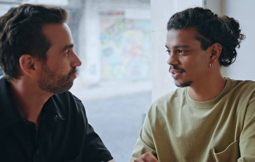 Two men discussing alcohol treatment and recovery support in Connecticut