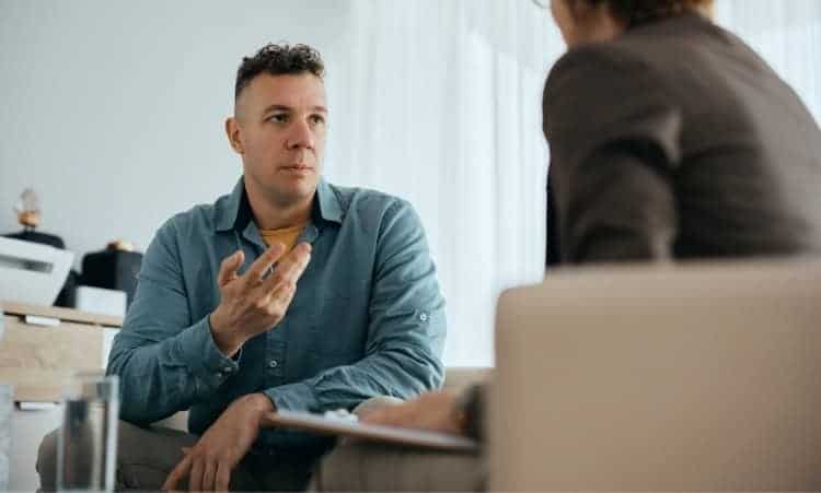 Man in intensive outpatient therapy for addiction recovery in Essex, CT