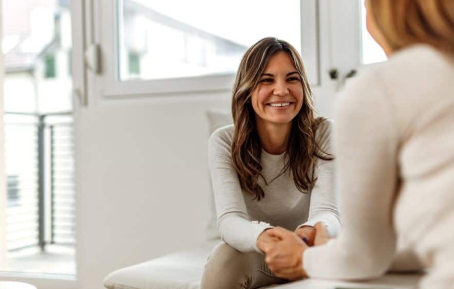 Woman in a supportive outpatient addiction counseling session in Connecticut