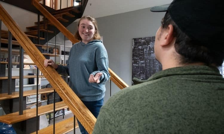 Recovery specialist speaking with a client during in-home outpatient addiction treatment Connecticut