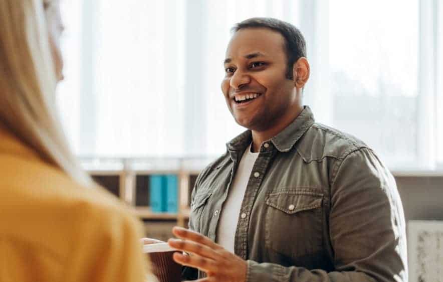 Man discussing alcohol recovery support with a counselor in Essex, CT.